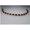 Image 1 : Glittering Garnet Tennis Bracelet with 20 oval  Garnets and side Diamonds weighing approx. 8.00  car