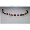 Image 2 : Glittering Garnet Tennis Bracelet with 20 oval  Garnets and side Diamonds weighing approx. 8.00  car