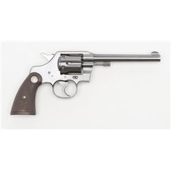 Colt Official Police DA revolver, .22LR cal., 6”  barrel, blue finish, checkered wood medallion  gri