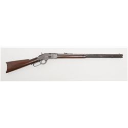 Winchester Model 1873 lever action rifle, .38  W.C.F. cal., 24” octagon barrel, plain trigger,  blue