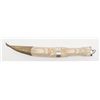 Image 1 : 20th century dagger in carved bone body mounted  with silver and hammered brass. Simulated damascus