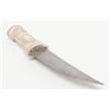 Image 6 : 20th century dagger in carved bone body mounted  with silver and hammered brass. Simulated damascus