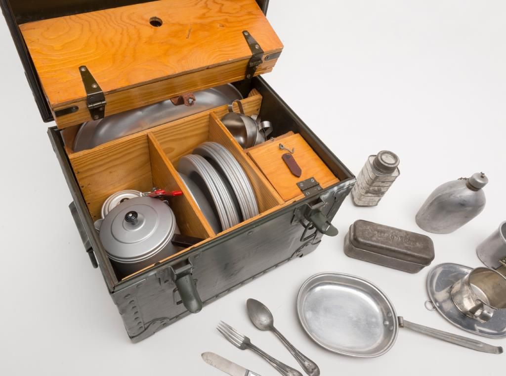 Military cook’s field mess kit in metal box with extra utensils in ...
