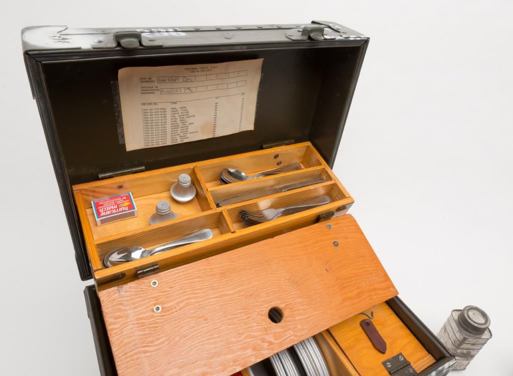Military cook’s field mess kit in metal box with extra utensils in ...