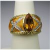 Image 2 : Dramatic Citrine and Diamond Ring with Enameling  Citrine weight approx. 3.00 carats with 32 round