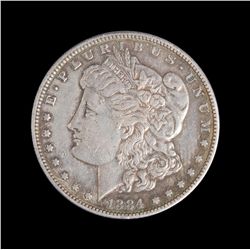 Lot including a U.S. Morgan Silver Dollar, dated  1881-S, un-graded; appears to be in choice  proof-