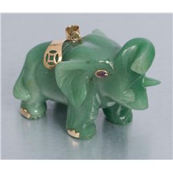 14K gold mounted jade elephant netsuke size with  jeweled eyes circa 1950s to 60s. Can be worn as a