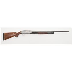 Winchester Model 12 pump action takedown shotgun,  12 gauge, 28” barrel, blue finish, wood stocks,