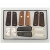 Image 2 : Riker case of 6 pair of Colt semi-auto pistol  grips including a pair of 1911 checked wood grips  in