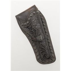 Tooled single loop leather holster for a SAA  5-1/2” revolver with metal studs, un-marked, in  overa