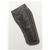 Image 1 : Tooled single loop leather holster for a SAA  5-1/2” revolver with metal studs, un-marked, in  overa