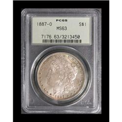 U.S. Morgan Silver Dollar dated 1887-O,  PCGS-graded MS63.   Est.:  $75-$150.