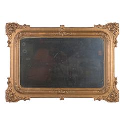 Antique bevel glass mirror with fancy gesso over  wood frame circa 1900 or before. The mirror  measu