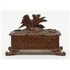 Image 3 : Small black forest style antique carved wooden box  with game birds; old damage to front lid edge.