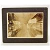 Image 1 : ANTIQUE MOUNTED PHOTO OF A DRY GOODS STORE INTERIOR