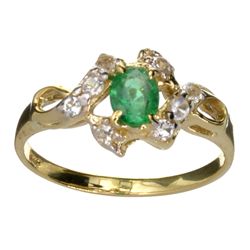 APP: 2.2k 14 kt. Gold, 0.40CT Emerald And Topaz Ring