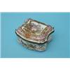 Image 1 : A German porcelain Meissen style bombe front casket, the hinged lid painted with children fishing...
