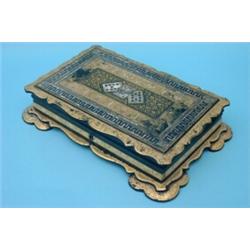 A Chinese export lacquer games box, the shaped hinged lid parcel-gilded and inlaid with mother-of...