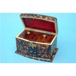 A Regency tortoiseshell veneered bow fronted 2 division tea caddy fitted interior lids, the finia...