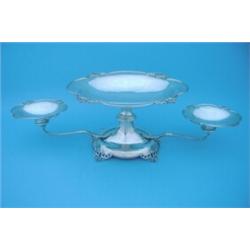 A George V silver epergne with lobed central dish on waisted support flanked by 2 similar smaller...