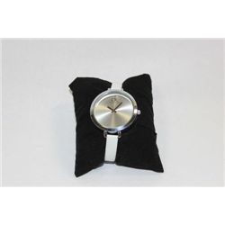 CK WATCH WOMEN'S WHITE STRAP
