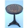 Image 1 : A Victorian rosewood and parquetry games table, the circular top inlaid for chess and with specim...