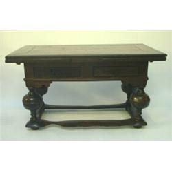 A Dutch oak draw-leaf side table, having cleated top over a pair of short frieze drawers, on mass...