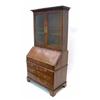 Image 1 : A George II walnut bureau bookcase, feather-banded and crossbanded having modified moulded and de...
