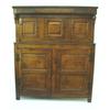 Image 1 : A George II oak press cupboard, the cornice initialled `R.A.P' and dated 1743 over recessed cupbo...