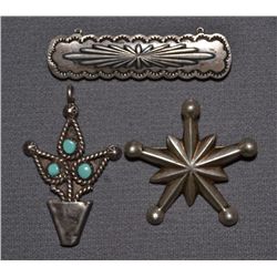THREE SILVER NAVAJO PINS/PENDANTS