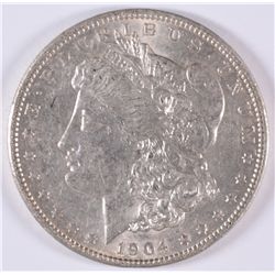 1904 MORGAN SILVER DOLLAR, AU-58