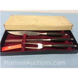 older three-piece carving set in original box
