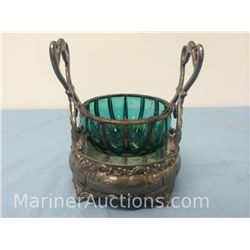 Antique green glass bowl in metal holder