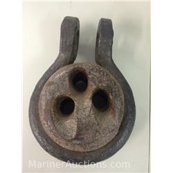Antique wood and cast pulley