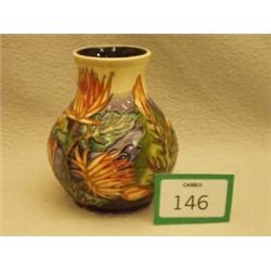 Moorcroft vase decorated with flowers, 6.5" high…