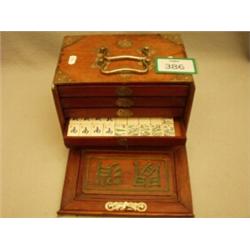 Walnut and brass bound mahjong set with ivory counters…
