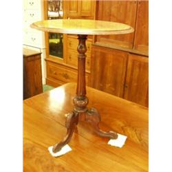 Walnut tripod table with acanthus leaf decoration to base, round top with inlaid marquetry flower…