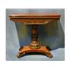 Image 1 : A William IV mahogany tea table with crossbanded top and carved apron, raised on a turned and car...