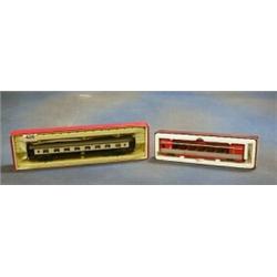 An Rivarossi model of an Orient Express Pullman Car together with a Bemo model of BVQ Zermatt-Bah...