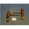 Image 1 : A 19th Century steel corkscrew with turned handle and brush and 1 other (2) £20-30...