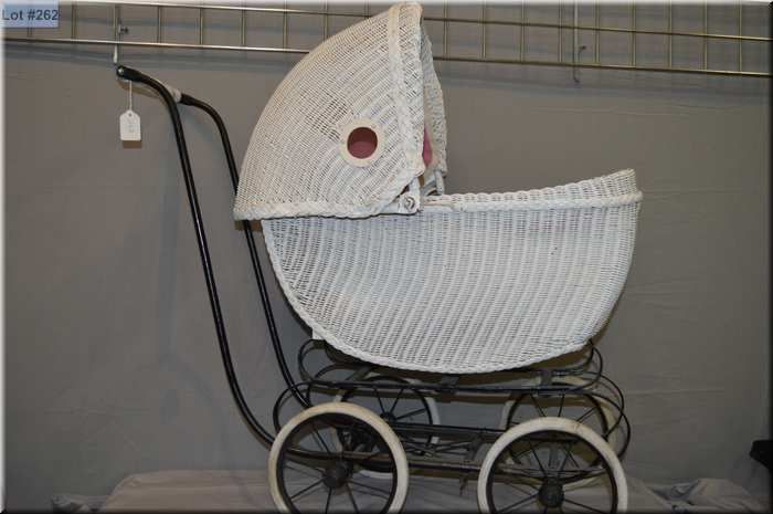 white wicker doll carriage