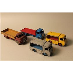 LOT OF 4 DINKY TRUCKS INCL. NO. 522 BIG BEDFORD, NO. 512 GUY, NO. 30V N.C.B. ELECTRIC VANS (X2)