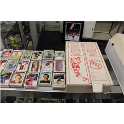 VINTAGE 16 TEAM MAIL AWAY LOCKER, WITH NEAR COMPLETE SETS OF 1975-76 AND 1977-78 OPC HOCKEY