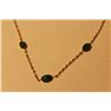 Image 2 : 10KT. YELLOW GOLD NATURAL EMERALD NECKLACE. BEZEL SET WITH A TOTAL OF 11