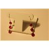 Image 1 : PAIR OF 14KT. YELLOW GOLD DANGLING RUBY EARRINGS SET WITH A TOTAL OF 6 ROUND MIXED CUT GLASS