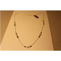 14KT YELLOW GOLD NATURAL TANZANITE AND NATURAL WHITE CRYSTAL OPAL NECKLACE.  BEZEL SET WITH  5 OVAL