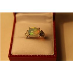 LADIES 14KT. WHITE GOLD NATURAL WHITE CRYSTAL OPAL & DIAMOND SET DRESS RING.  BEAD SET WITH 1 ROUND