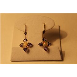 PAIR OF 14KT YELLOW GOLD DANGLING NATURAL WHITE CRYSTAL OPAL AND NATURAL TANZANITE EARRINGS.  BEZEL