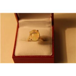 LADIES 10KT. YELLOW GOLD NATURAL JELLY OPAL DRESS RING.  FOUR CLAW SET WITH