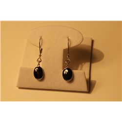 PAIR OF 14KT WHITE GOLD DANGLING BLACK AND NEAR COLOURLESS DIAMOND SET EARRINGS SET WITH 2 PEAR